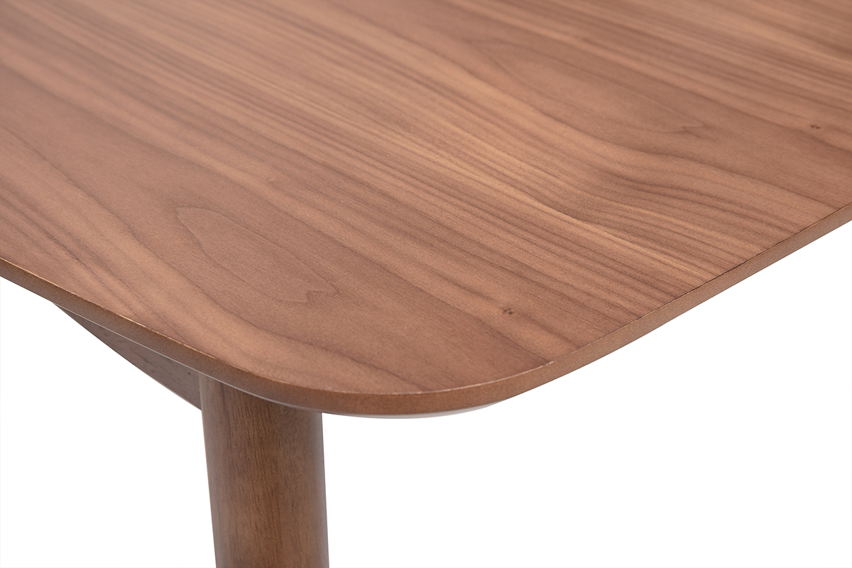 Gros plan sur le coin d'une table en bois fonc� noyer avec placage visible.